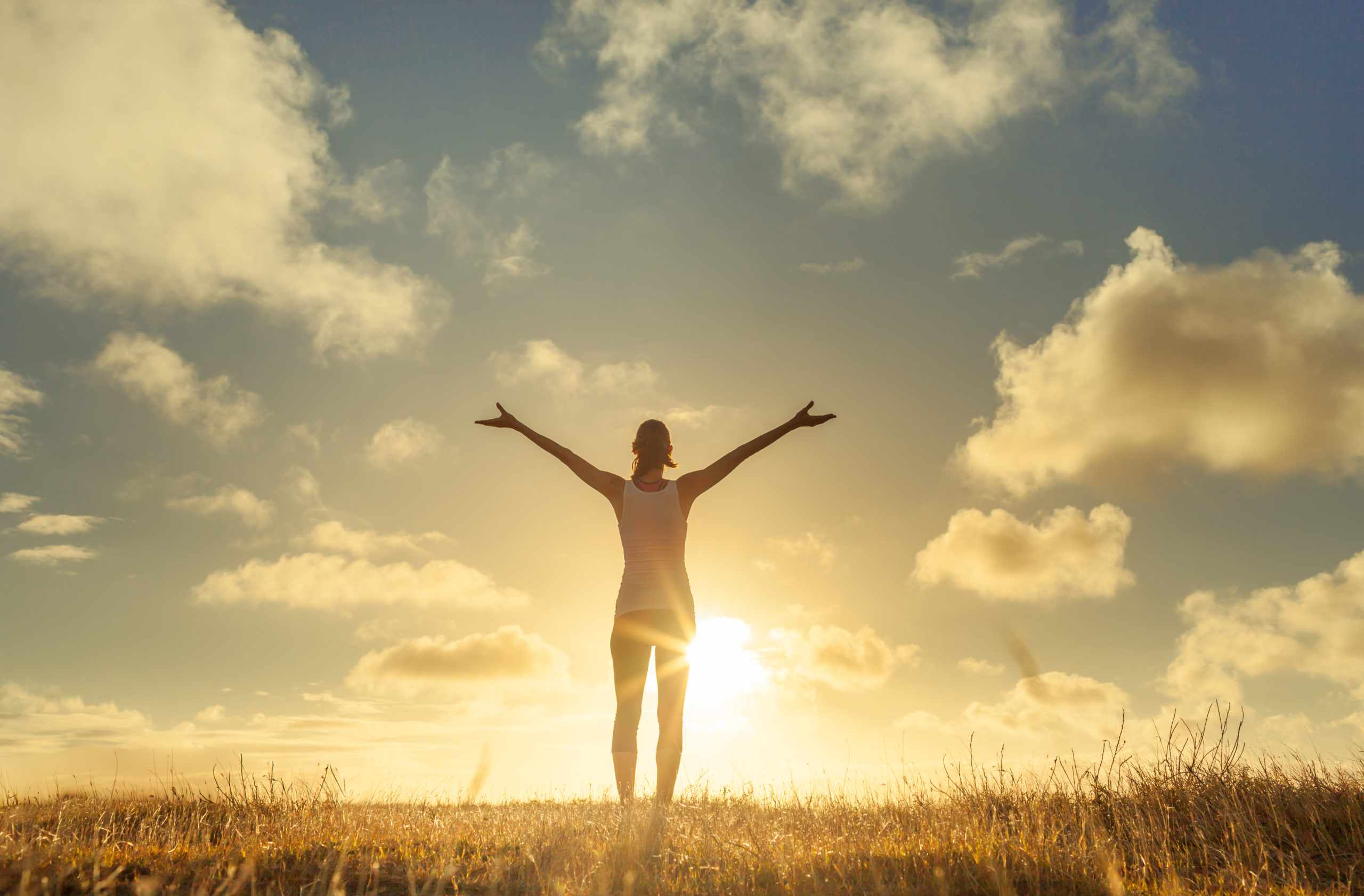 Person happy due to reduced pain and better mobility after direct current neurotherapy with the Phoenix Waveform EMS device